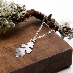 Polished silver lichen pendant