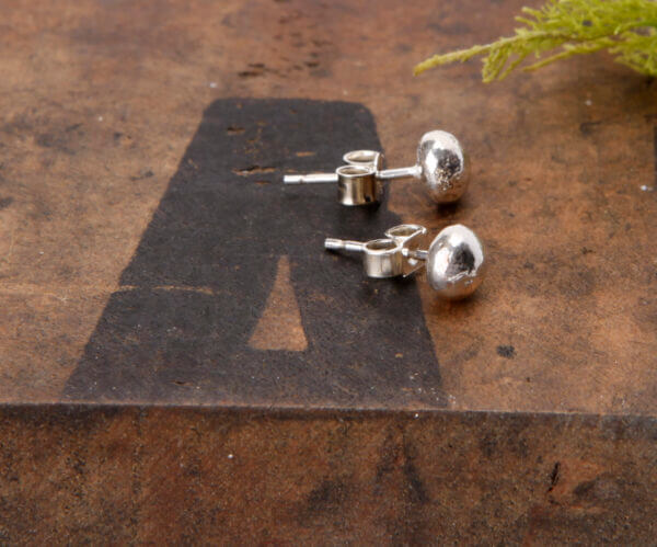 molten silver stud earrings front