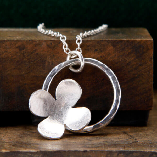 simple flower in circle pendant