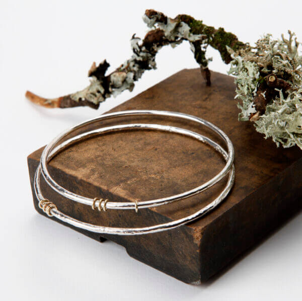 sterling silver bangles with 9ct gold ring detail