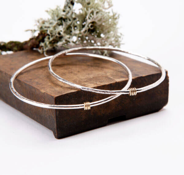 sterling silver bangles with 9ct gold ring detail