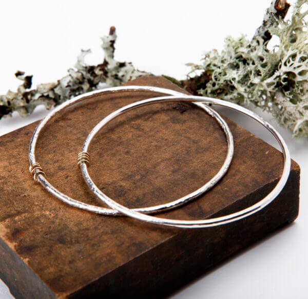 sterling silver bangles with 9ct gold ring detail