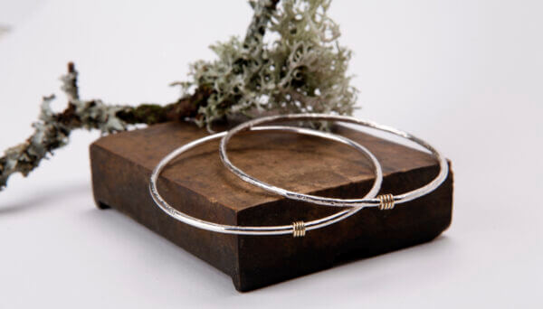 sterling silver bangles with 9ct gold ring detail