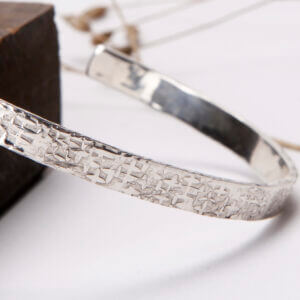 Textured silver cuff bangle