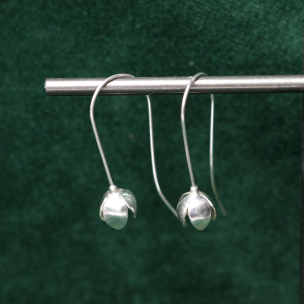 Closed wildflower drop earring